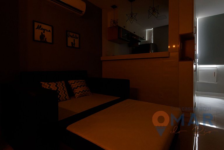Omar do Rio: Dormitorio y sala a 200m de la Playa de Copacab